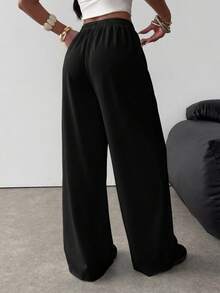 SHEIN Quần nỉ rộng rãi thoải mái cho nữ tuổi teen, có túi, màu xám hoa nhạt. - màu đen - Xem 3