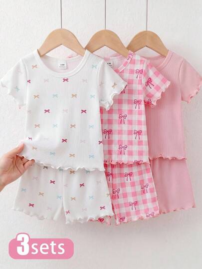 SHEIN 6pcs/Set Baby Girl White & Pink Plaid Bow Print Solid Color Round Neck Short Sleeve T-Shirt Paired With Matching Elastic Waist Shorts, Ruffled Knit Soft Ribbed Fabric, Casual Lively Sweet Cute Comfortable Outfit, Suitable For Daily Outings, School, Shopping, Park, Travel, Photography, Sports And Other Occasions
