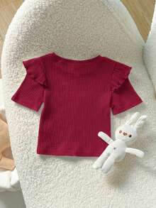 Cozy Pixies Blusa de punto suave de unicolor con cuello redondo y mangas cortas con volantes para niña bebé - Burdeos - Ver 2