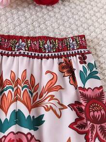 SHEIN Bộ 2 món cho bé gái tuổi teen, gồm áo dệt kim cổ tròn tay phồng và quần ống đứng in họa tiết, phong cách thường ngày thoải mái, phù hợp cho mặc hàng ngày và đi nghỉ mát mùa xuân/hè. - Đỏ - Xem 7