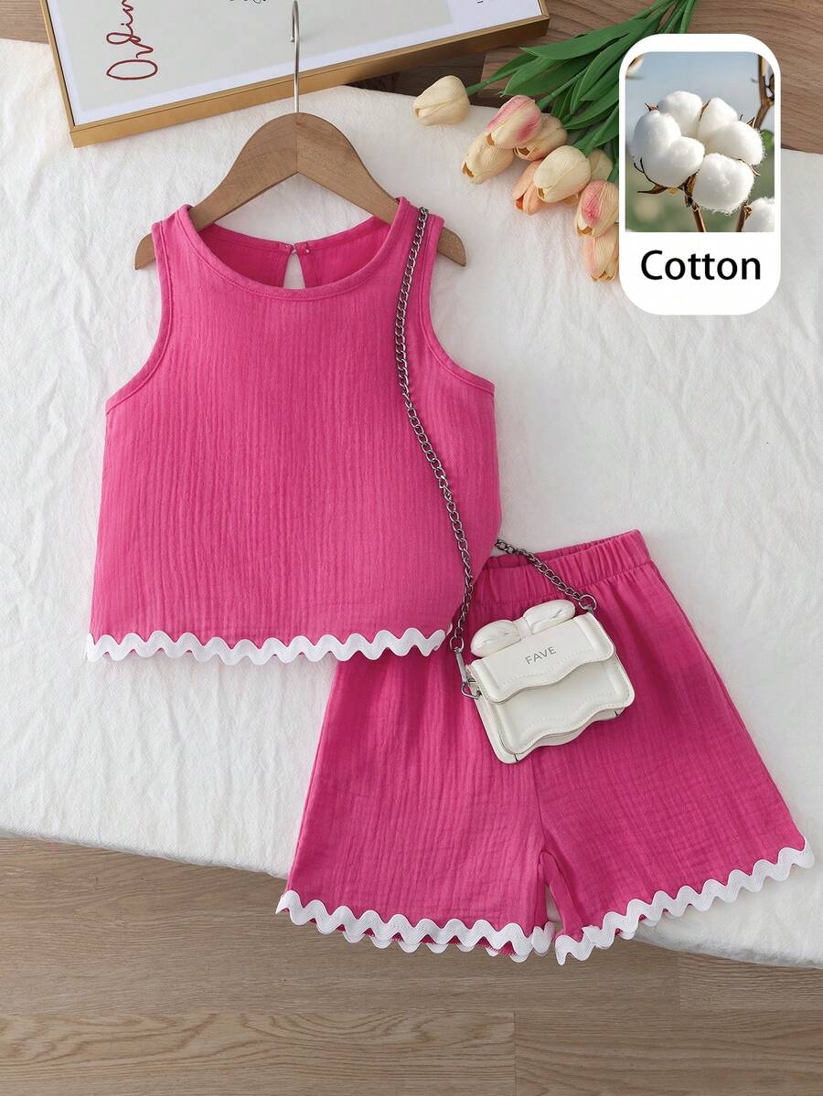 Elladie kids 两件套女童玫红色荷叶边套装,包括一件无袖露脐上衣和一条配套短裤。下摆和袖口的波浪形荷叶边细节增添了俏皮青春的气息,适合夏季外出、休闲穿着和周末聚会。 - 玫紅色 - 查看 1