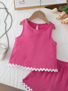 Elladie kids 两件套女童玫红色荷叶边套装，包括一件无袖露脐上衣和一条配套短裤。下摆和袖口的波浪形荷叶边细节增添了俏皮青春的气息，适合夏季外出、休闲穿着和周末聚会。 - 玫紅色 - 查看 6