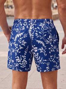 Manfinity Swimmode 男士夏季度假藍白花卉植物印花抽繩腰沙灘短褲，波西米亞風度假夏威夷熱帶泳褲，情侶約會穿搭 - 藏蓝色 - 查看 9