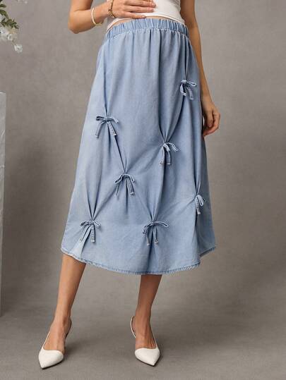SHEIN Chân váy denim màu trơn, kiểu dáng thường ngày, có chun co giãn, trang trí nơ, dành cho bà bầu.
