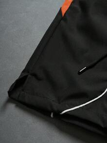 Manfinity ZONE917 Pantalones cortos con cordón en la cintura, estampado de letras y parches de colores contrastantes para hombres - Naranja - Ver 3