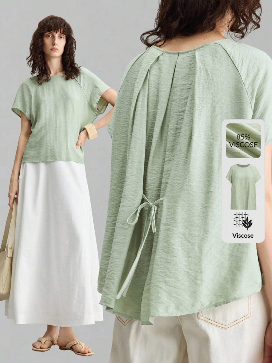 Ontre Đầm nữ dáng ôm thoải mái, thân thiện với da, cổ tròn, tay lỡ, lưng xếp ly, trang trí nơ, xẻ tà trước, đường may tinh tế, phong cách bohemian hiện đại, thích hợp cho bãi biển, lễ hội âm nhạc, dạo phố, thanh lịch, sang trọng, đa năng. - Màu xanh Bạc hà - Xem 1