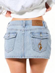 BABYPHAT Logo Denim Mini Skirt Low Rise Y2K Streetwear Retro Embroidered Jean Skirt With Flap Pockets - Light Wash - View 1
