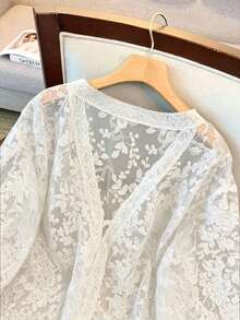 GlowEve CURVE Áo khoác cardigan nữ cỡ lớn cổ chữ V, thắt nơ phía trước, chất liệu xuyên thấu, cổ choàng, tay lửng, thêu, khoét lỗ. - trắng - Xem 3