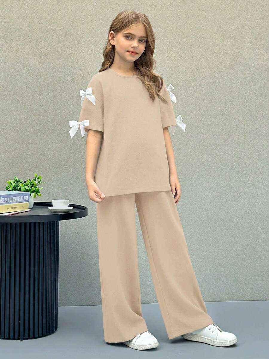 SHEIN Nova Glow 少女纯色圆领蝴蝶结宽松T恤和宽松长裤两件套休闲套装 - 杏色 - 查看 1
