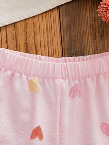 SHEIN Genkimix Kids Conjunto de verano para niñas de 4 a 7 años, estilo dulce y fresco, con top sin mangas con volantes y estampado de corazones de burbujas y arruga de agua, talla grande pantalón corto a juego estampado, de mezcla de algodón suave y ligera, adecuado para juegos al aire libre y uso diario casual en verano - Rosa - Ver 4