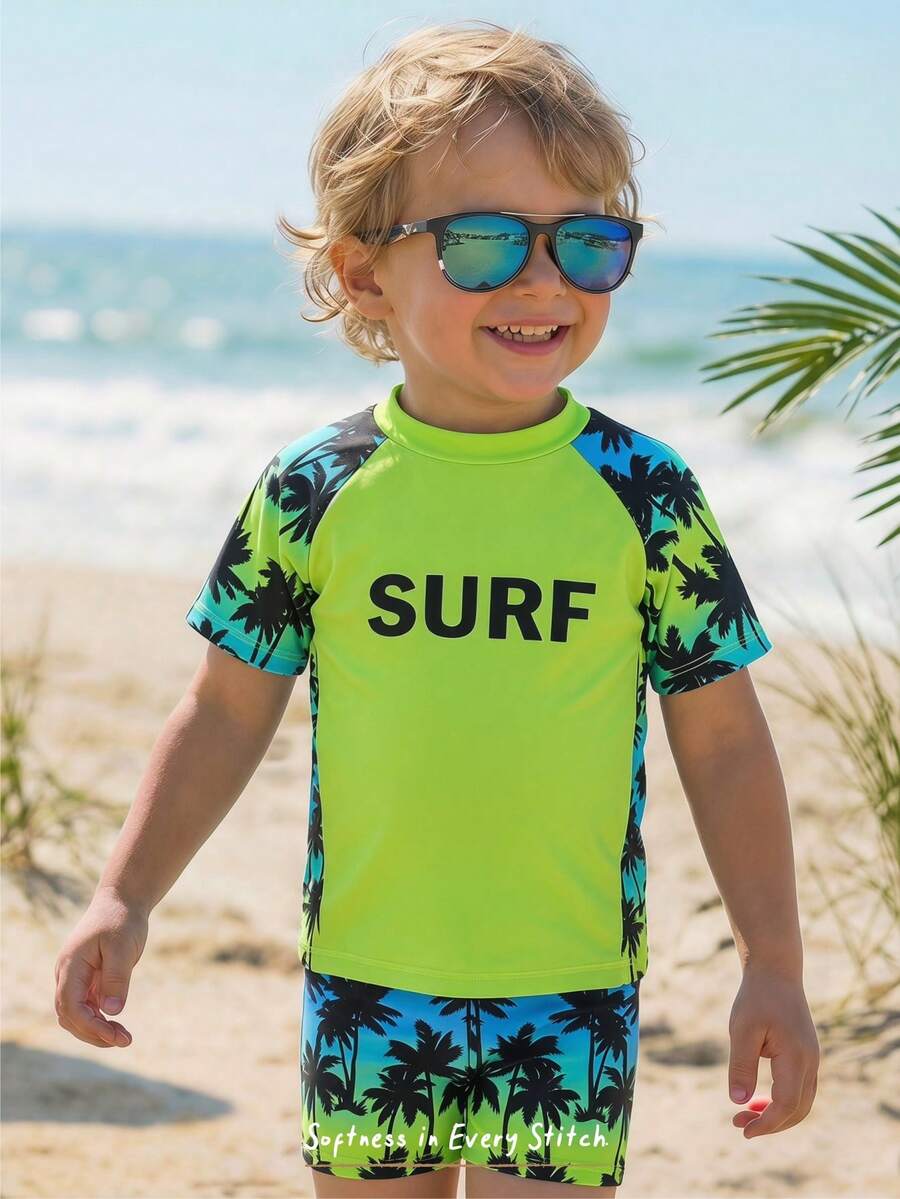 SHEIN Setelan Anak Laki-Laki untuk Liburan Pantai, Motif Pohon Palem, Lengan Raglan Elastis Tinggi dan Celana Pendek Olahraga Kasual, Cocok untuk Liburan Pantai dan Berenang. - Hijau - View 1