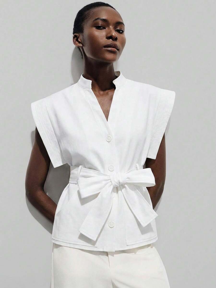 Aveloria Modichic European And American Style Spring/Summer New Fashionable Versatile Solid Color Butterfly Sleeve V-Neck Tie Waist Sleeveless Blouse - White - View 1