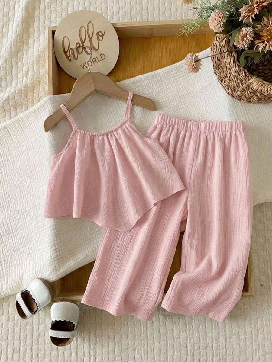 SHEIN LMoss Kids 这款两件套可爱女婴休闲纹理面料吊带背心和松紧腰裤套装适合生日派对、晚宴、演出、婚礼、洗礼和开幕式等场合,是春夏季节的完美之选。 - 淺粉色 - 查看 1