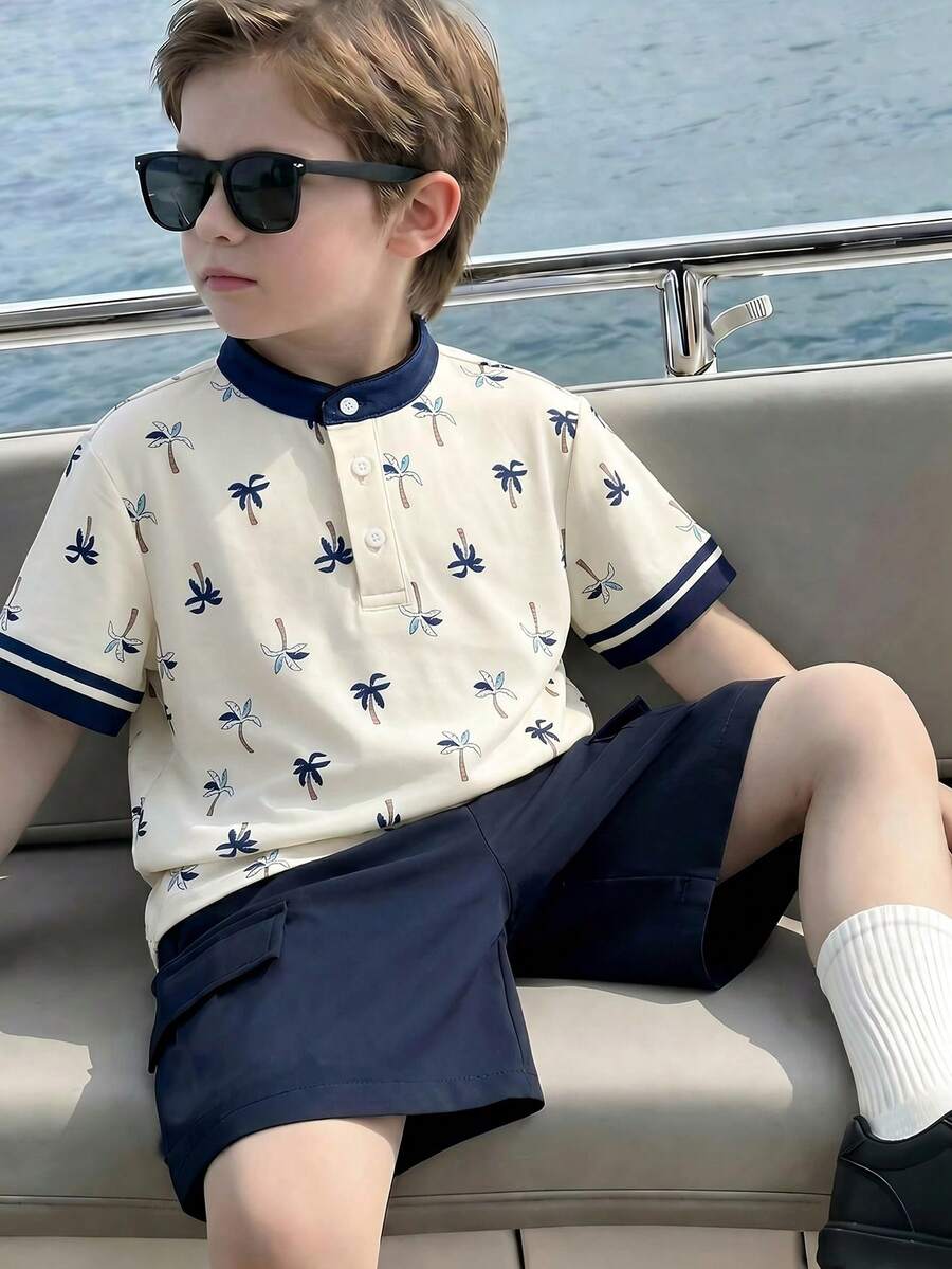 SHEIN 男童两件套:白色翻领海岛印花短袖Polo衫和藏蓝色短裤,休闲舒适,百搭,适合日常穿着、旅行、户外活动、度假、海滩度假、春夏穿着。 - 彩色 - 查看 1