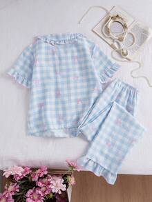 Bộ đồ ngủ 2 mảnh phong cách ngọt ngào dành cho bé gái tuổi teen: Áo cardigan tay ngắn in họa tiết kẻ caro và nơ, kèm quần ống rộng viền bèo nhún. - Nhiều màu - Xem 8