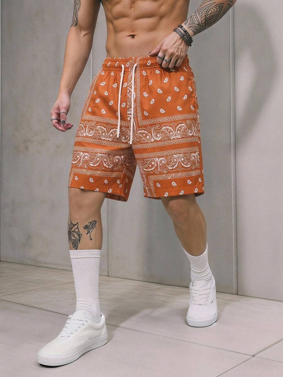 GENTILAND Quần short nam in họa tiết hạt điều, cạp chun có dây rút và túi hai bên. - trái cam - Xem 1