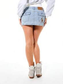 BABYPHAT Logo Denim Mini Skirt Low Rise Y2K Streetwear Retro Embroidered Jean Skirt With Flap Pockets - Light Wash - View 5