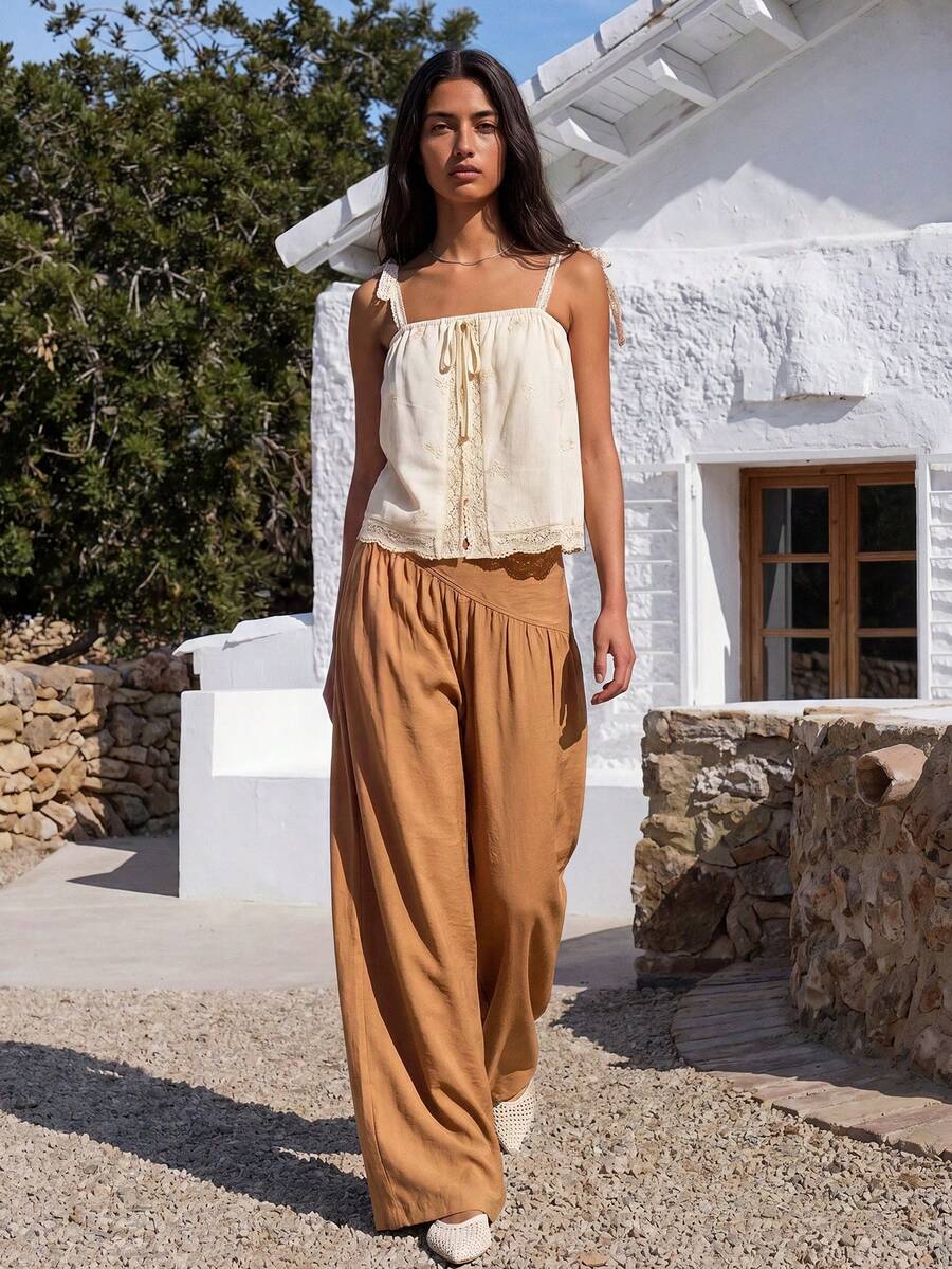 Nöista Wide-Leg Pants In A Dark Brown An Asymmetrical Waistband For Flattering Fit. Perfect Casual Outings, Autumn Festivals, Relaxed Boho Look, Vacation - Brown - View 1