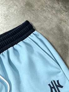 Manfinity EMRG Conjunto de camiseta y pantalones cortos de color contrastante casual para hombres, verano, vacaciones - Multicolor - Ver 7