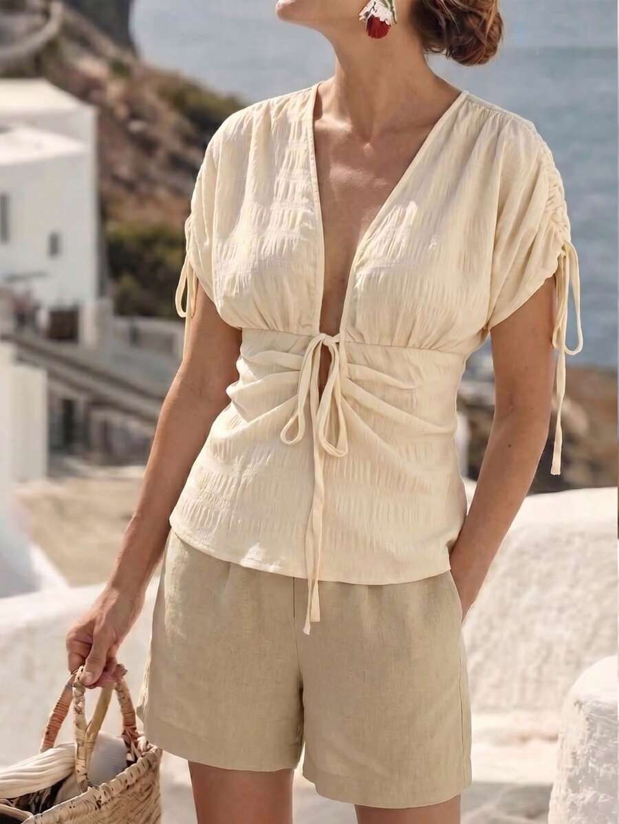 SHEIN Holidaya Women's Spring/Summer Casual Sexy Vacation Comfortable Outerwear, Deep V-Neck Bow Decor Ruched Waist A-Line Blouse Golf White - Apricot - View 1