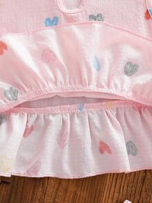 SHEIN Genkimix Kids Conjunto de verano para niñas de 4 a 7 años, estilo dulce y fresco, con top sin mangas con volantes y estampado de corazones de burbujas y arruga de agua, talla grande pantalón corto a juego estampado, de mezcla de algodón suave y ligera, adecuado para juegos al aire libre y uso diario casual en verano - Rosa - Ver 8