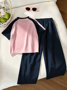 SHEIN Tween女孩T恤套裝，運動風粉色與深綠色拼接短袖T恤與短褲套裝，夏季寬鬆版型設計，輕量面料，適合日常穿著、休閒運動或搭配造型，返校季 - 藏蓝色 - 查看 2