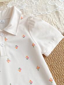 Đầm ngắn tay màu hồng cổ polo in họa tiết cầu vồng, viền bèo nhún, kiểu dáng thường ngày cho bé gái. - trắng - Xem 4