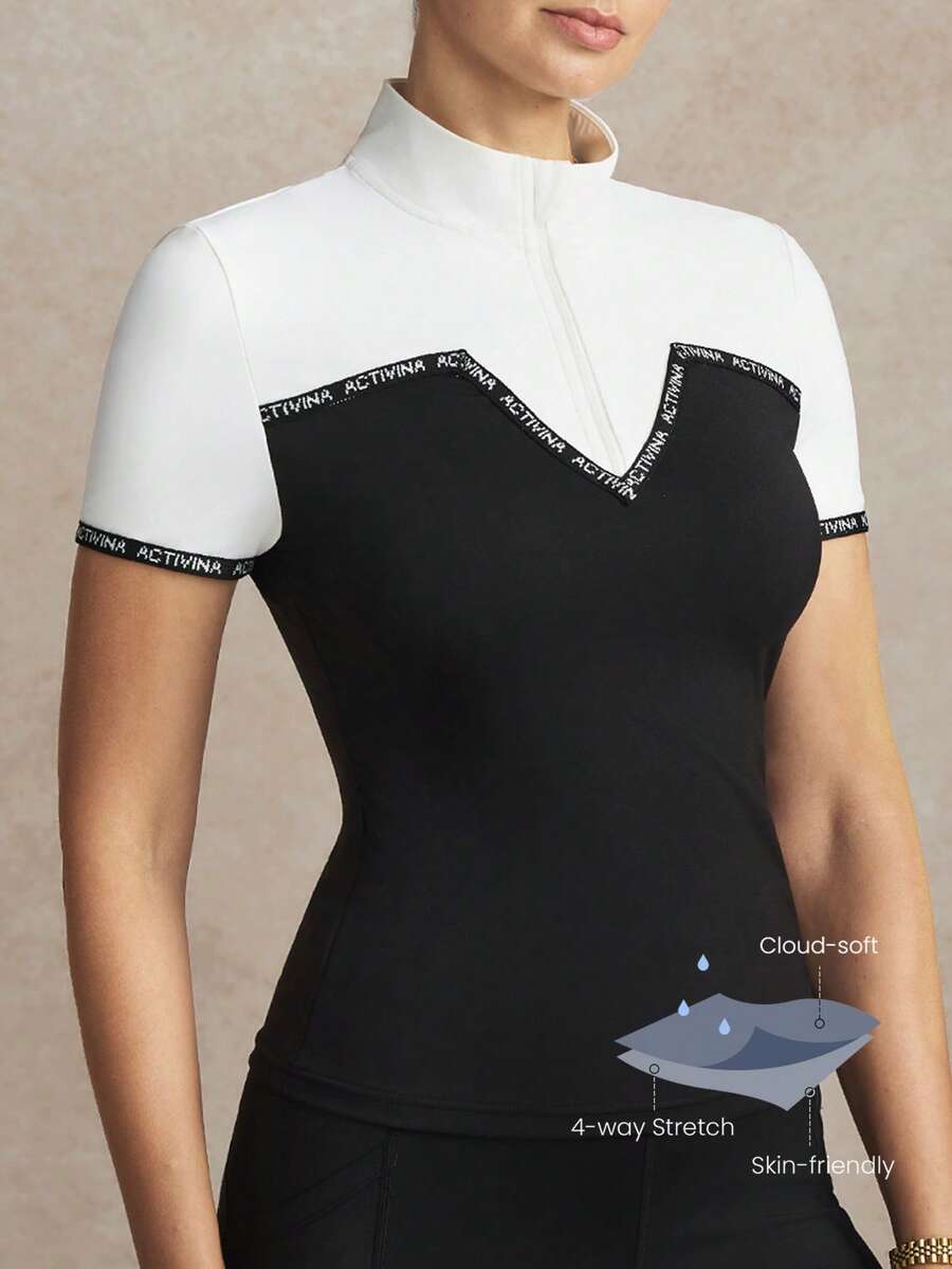 Activina Conjunto ecuestre de mujer con cuello Mao y manga corta de color contrastante - Blanco y Negro - Ver 1