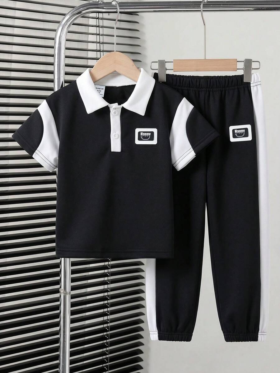 SHEIN Streecool Kids 男童休闲Polo衫长裤套装(2件套),宽松版型,撞色设计,适合日常、休闲、度假、聚会、街头风格等场合。 - 黑色 - 查看 1