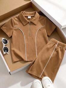 SHEIN Bộ 2 món áo polo và quần short dệt kim rộng rãi, màu trơn, thích hợp cho bé trai mặc đi học, dự tiệc sinh nhật, các sự kiện buổi tối, biểu diễn, đám cưới, lễ rửa tội, lễ tốt nghiệp. Phù hợp cho mặc hàng ngày, đi học, du lịch, thể thao, phong cách Trung Đông, mùa xuân, mùa hè. - Cà phê nâu - Xem 1