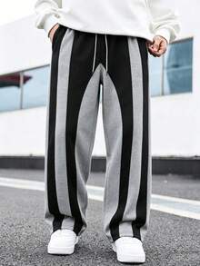 Manfinity Hypemode Pantalones de chándal casuales y holgados con cintura con cordón y bolsillos, de color contrastante - Gris - Ver 4