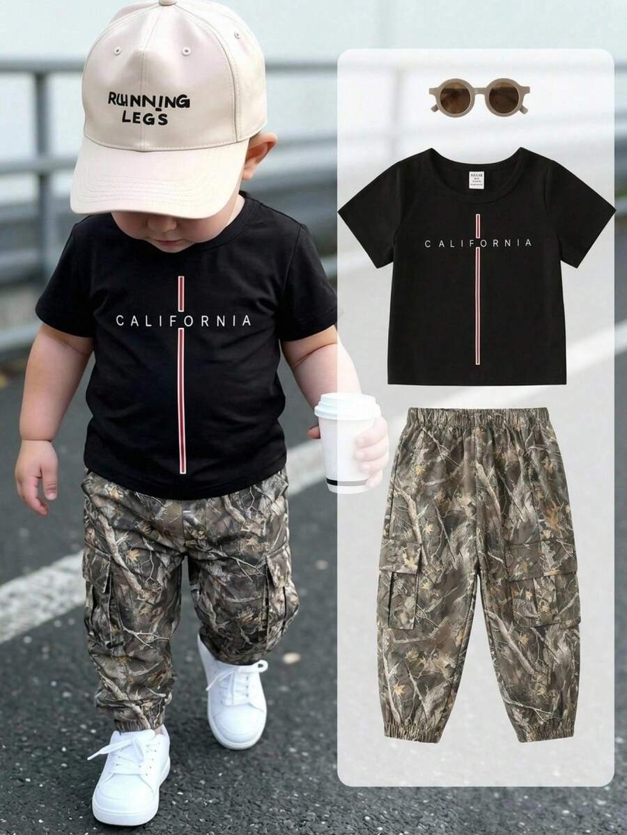 SHEIN 2 peças/Conjunto Roupa de Verão Estilo Urbano Fofo para Menino Bebê, Camiseta de Manga Curta Preta & Calça de Cintura Elástica Verde, Conjunto de Calça Cargo Camuflada, Conjunto de Camiseta, Conjunto de Roupa Infantil - Multicolorido - Visão 1