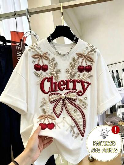 Resyla Camiseta de mujer con cuello redondo y decoración de perlas falsas, patrón bordado de flores de cerezo, uso diario casual y versátil
