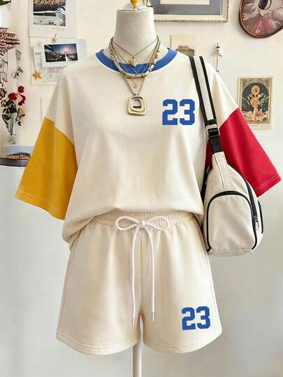 Lalippa Bộ đồ nữ 2 mảnh gồm áo cổ tròn in số và quần short cạp chun có dây rút, kiểu dáng thường ngày.