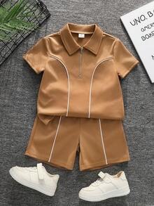 SHEIN Bộ 2 món áo polo và quần short dệt kim rộng rãi, màu trơn, thích hợp cho bé trai mặc đi học, dự tiệc sinh nhật, các sự kiện buổi tối, biểu diễn, đám cưới, lễ rửa tội, lễ tốt nghiệp. Phù hợp cho mặc hàng ngày, đi học, du lịch, thể thao, phong cách Trung Đông, mùa xuân, mùa hè. - Cà phê nâu - Xem 2