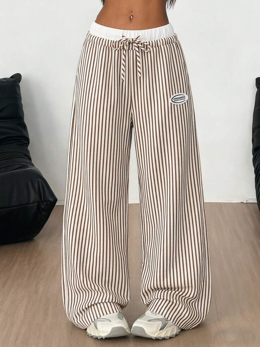 SHEIN Quần kẻ sọc tương phản thoải mái thường ngày dành cho bé gái tuổi teen. - Nhiều màu - Xem 1