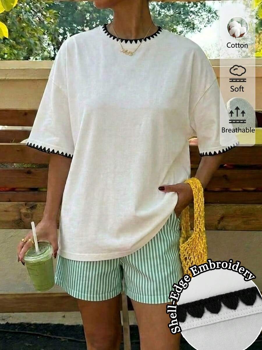 Muchica Áo thun nữ màu trắng dáng rộng, chất liệu 34% cotton, kiểu dáng tối giản, thêu hình vỏ sò – Cổ tròn, tay ngắn, dáng suông thoải mái, phong cách mùa hè dễ thương, dịu dàng, sạch sẽ, mang hơi hướng Y2K cổ điển, hoàn hảo cho kỳ nghỉ xuân/hè, du lịch, lễ hội miền Tây, hẹn hò, tiệc trà chiều, mặc nhà thoải mái và đi học. - trắng - Xem 1