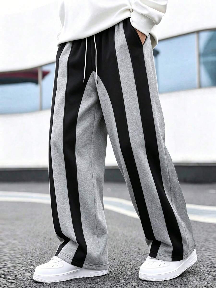 Manfinity Hypemode Pantalones de chándal casuales y holgados con cintura con cordón y bolsillos, de color contrastante - Gris - Ver 1