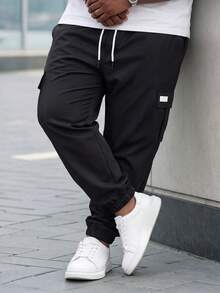 Manfinity Homme 男士成熟休闲工装裤，适合日常休闲穿着、周末郊游、户外活动、旅行探险以及年轻人的社交场合。这款裤子是男士衣橱中不可或缺的百搭单品，也是送给男友或丈夫的绝佳礼物。 - 黑色 - 查看 3