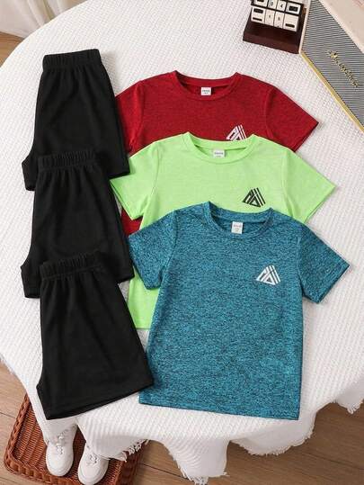 SHEIN 儿童夏季休闲运动风几何图案圆领短袖上衣和短裤两件套，适合户外运动和室内休闲。
