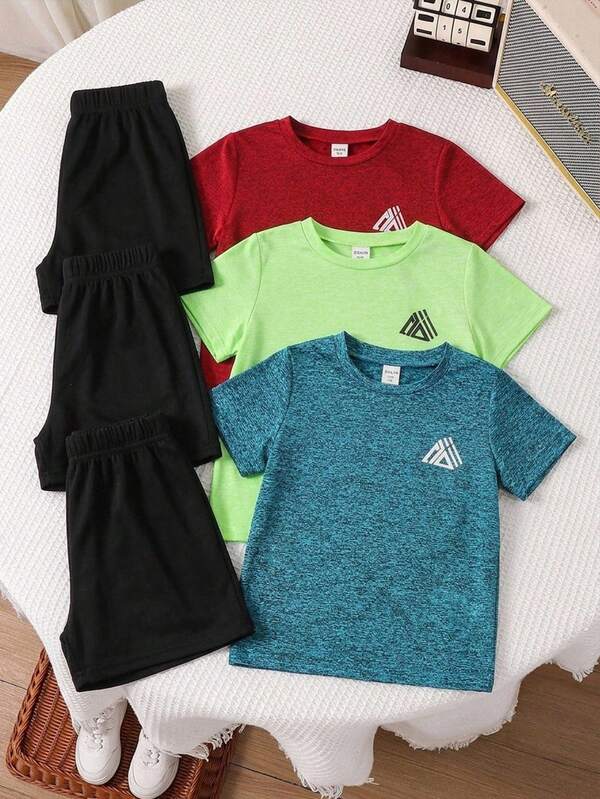 SHEIN 儿童夏季休闲运动风几何图案圆领短袖上衣和短裤两件套，适合户外运动和室内休闲。