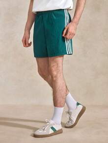 Courvante Quần short thể thao nam casual phối sọc tương phản màu xanh teal, quần tập gym thể thao bền màu xanh lá có túi - màu xanh lá - Xem 1