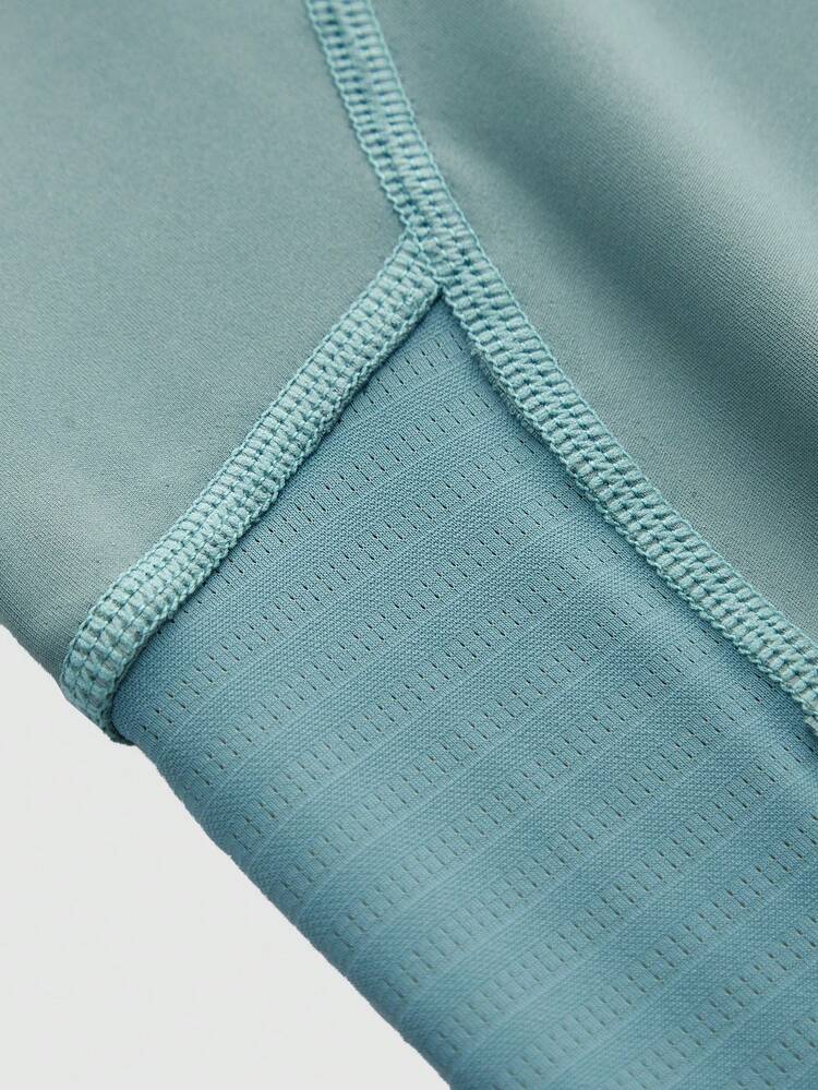 Cheerettes Quần legging nữ ôm sát, có chun co giãn, đường may tương phản. - Xanh lá cây Mù sương - Xem 4