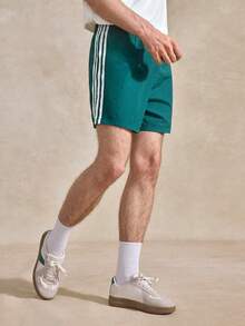 Courvante Quần short thể thao nam casual phối sọc tương phản màu xanh teal, quần tập gym thể thao bền màu xanh lá có túi - màu xanh lá - Xem 5