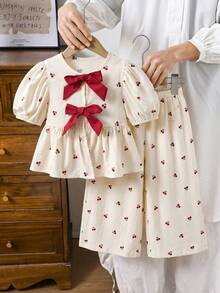 Emery Rose Kids Emery Rose Kids Bộ đồ 2 món cho bé gái: áo tay cánh hoa kẻ caro dệt kim và quần dài rộng. - Màu be - Xem 6