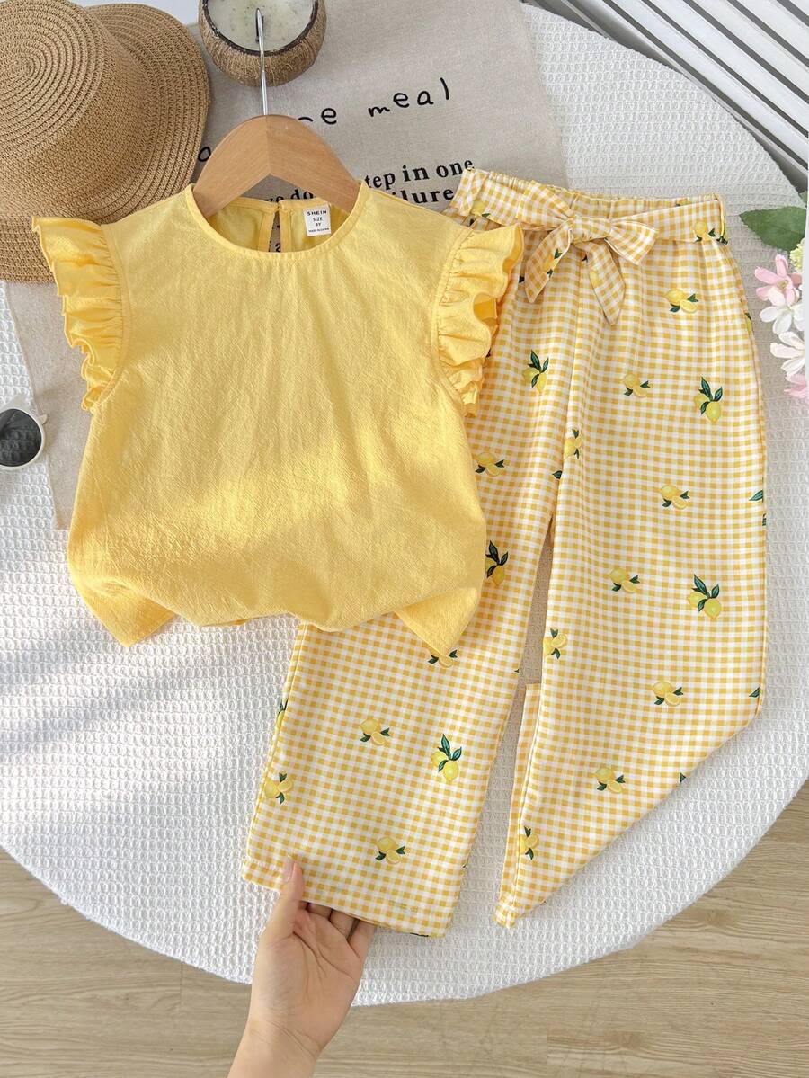 SHEIN Young Girls' Vacation Casual Halter Neck Sleeveless Fitted Solid Color Tank Top And Elastic Waist Ditsy Floral Ruffle Skirt Set, Summer - Yellow - View 1