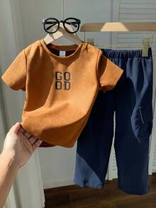 SHEIN Bộ 2 món cho bé trai gồm áo thun cổ tròn tay ngắn in chữ có túi hộp và quần màu tương phản, trang phục thể thao thường ngày phù hợp cho mùa xuân, hè, thu, đa năng cho kỳ nghỉ, đi học, dự tiệc. - Nhiều màu - Xem 3