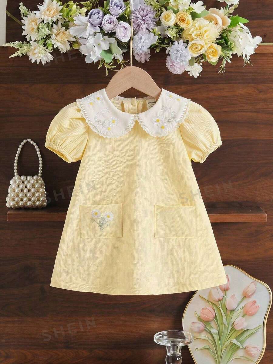 Souflis Gaun Bayi Perempuan Gaya Pastoral Lucu dengan Kerah Peter Pan, Bordir Bunga Matahari, Lengan Pendek, dan Saku, Musim Semi/Panas - Kuning - View 1