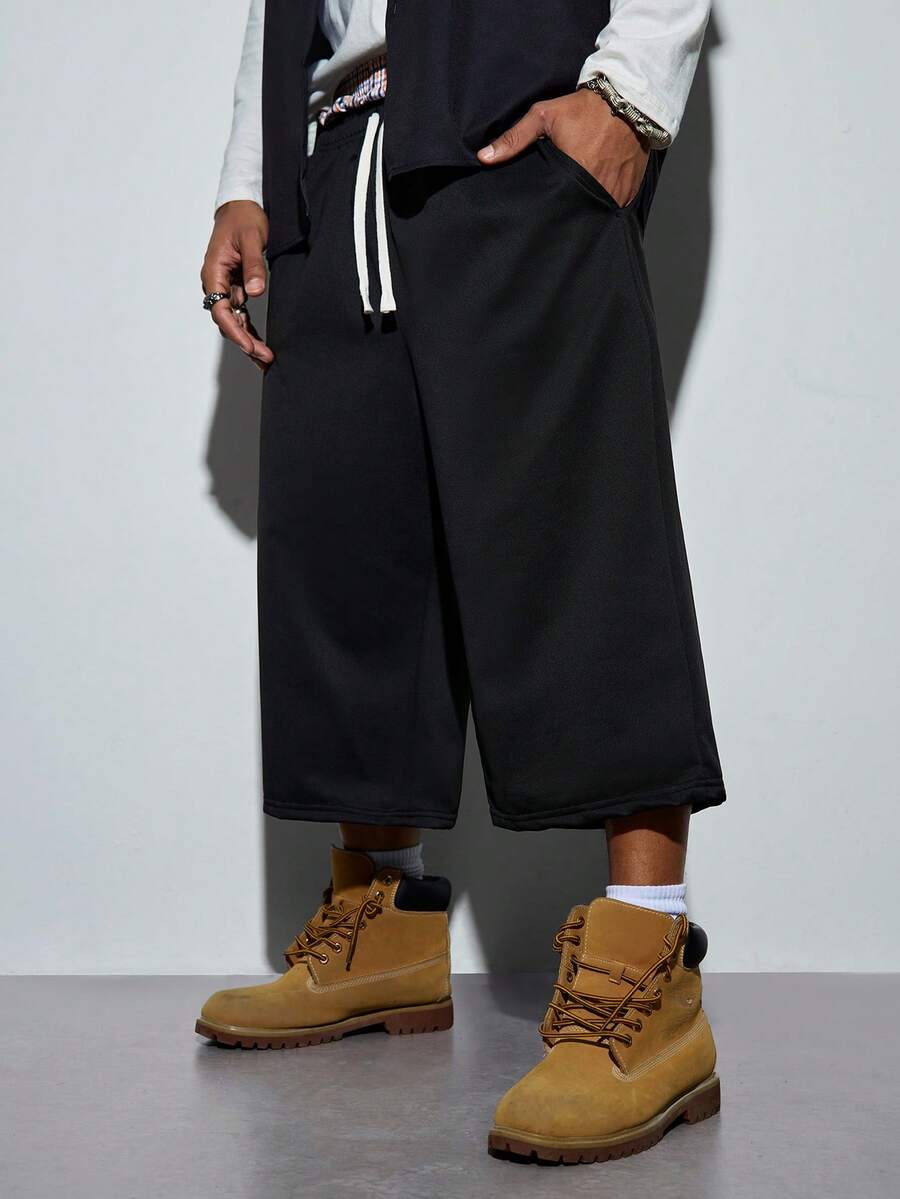 Modcrash Herren Sommer Neue Locker Sitzende Casual Sport Shorts, Fitness Shorts, Elastischer Bund mit Kordelzug verstellbar, Seitentaschen für bequemes Tragen, geeignet für Zuhause und Straßenmode - Schwarz - Übersicht 1
