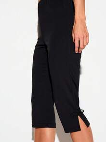 KIZN Quần legging lửng (capri) với chi tiết khóa hình ếch, eo chun, chiều dài lửng, xẻ tà bên hông, phong cách thường ngày năng động. - màu đen - Xem 4